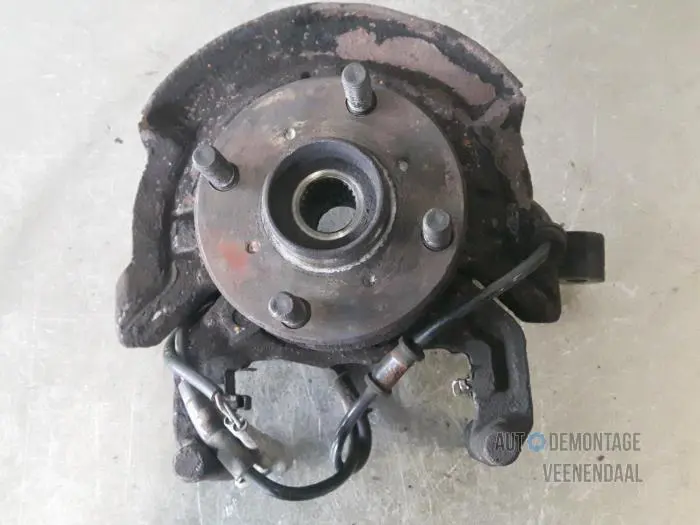 Knuckle, front right Daihatsu Sirion